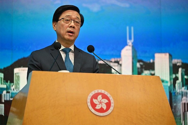 Wanted activists should surrender or 'spend days in fear': Hong Kong leader