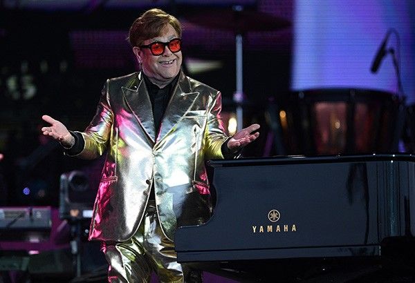Elton John hails fans at emotional final farewell show