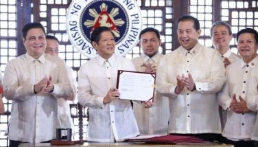 Speaker Ferdinand Martin G. Romualdez, with fellow lawmakers, applauds President Ferdinand R. Marcos, Jr. after the Chief Executive signed into law the bill establishing the Maharlika Investment Fund (R.A. 11954) in rites held at Malacanang Palace.