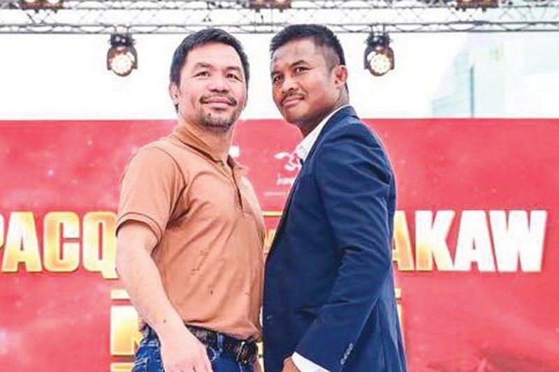 Pacquiao, Thailandâ��s Buakaw headed for boxing exhibition