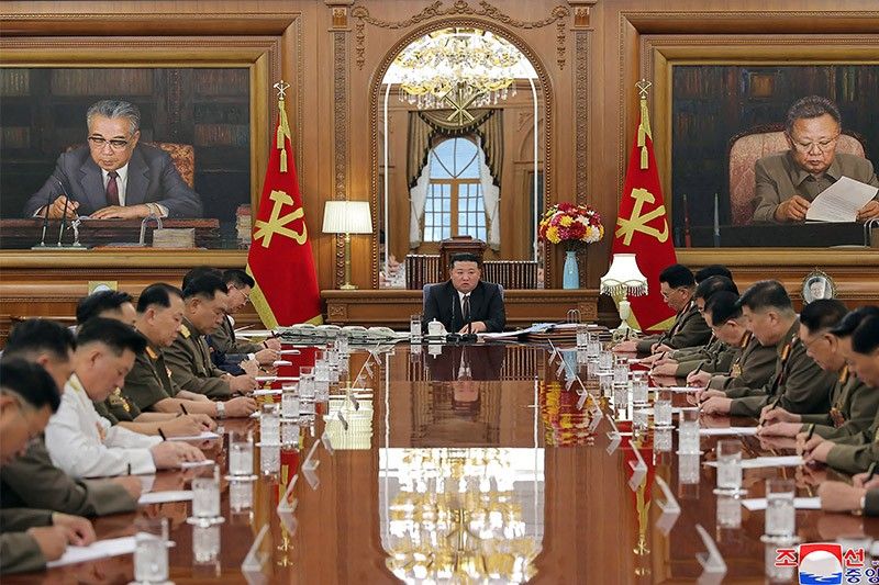 North Korea's Kim dismisses military chief, calls for war preparations