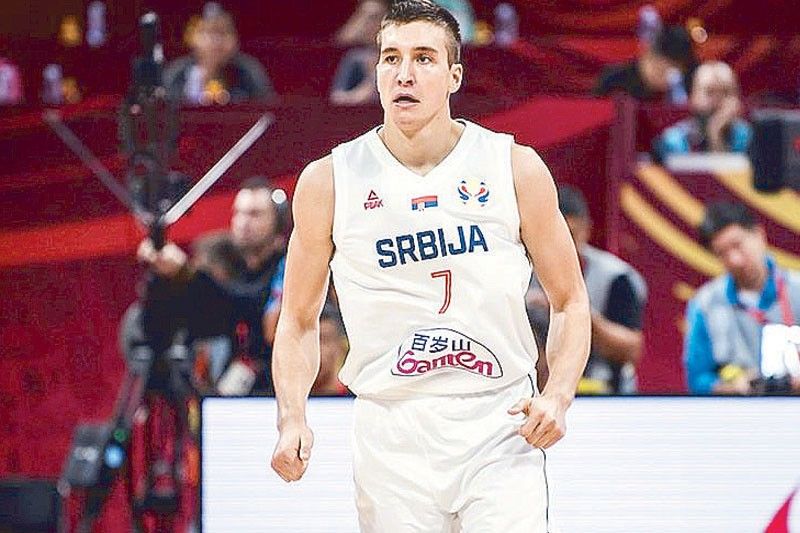 BasketNews on X: Bogdan Bogdanovic unveils the new Serbian national team  jersey ✊