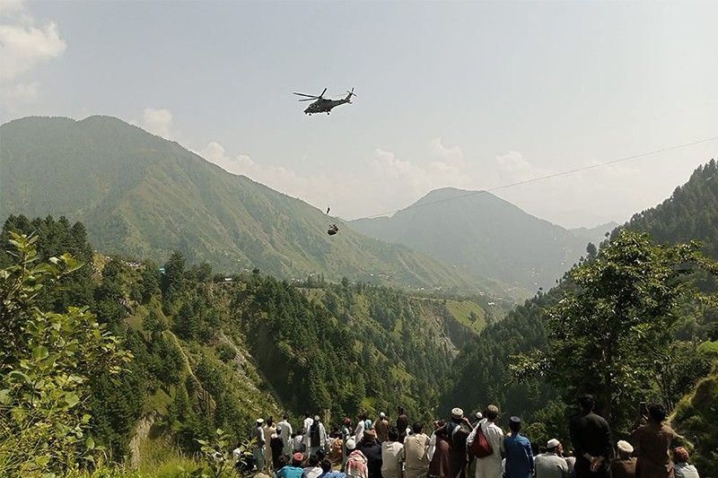 Children trapped in cable car dangling over Pakistan ravine