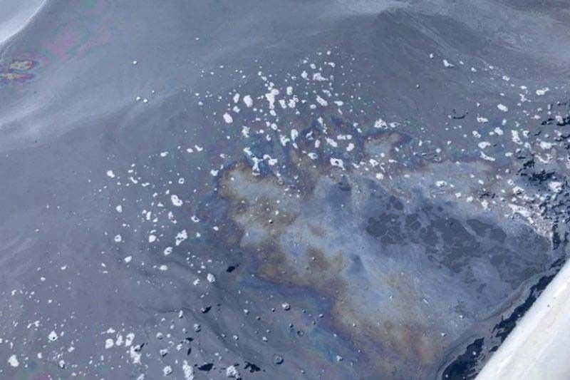 Oil sheen spotted from sunken vessel