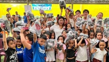 QC kids receive free school bags, shoes, vitamins