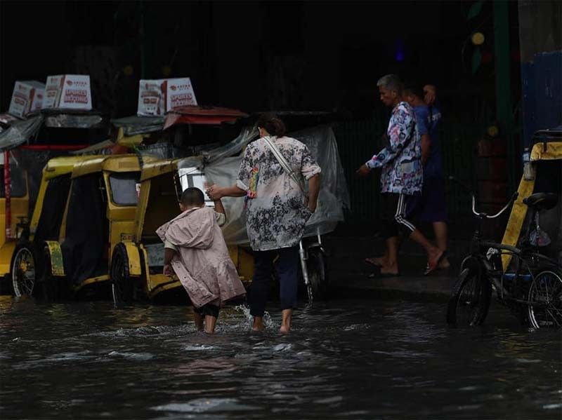 Hanna out, but monsoon rain persists