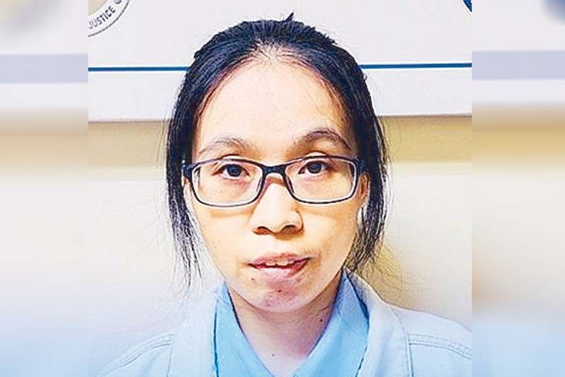 Chinese woman held over fake travel papers