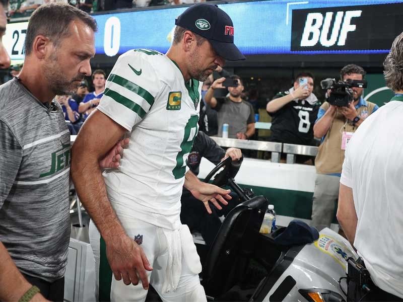 NFL star Rodgers exits early with serious injury in Jets win