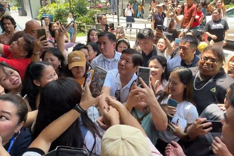 President Marcos surprises OFWs at Lucky Plaza Singapore