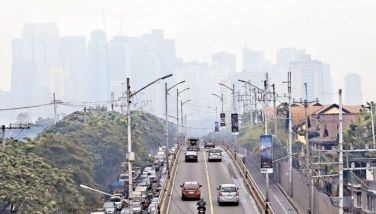 Photo shows the hazy Ortigas skyline caused by smog attributed to vehicular traffic emissions.