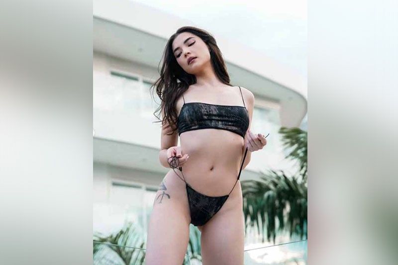 Rhian, nag-aapoy sa suot na tiny bikini kahit lubog sa baha ang Metro Manila