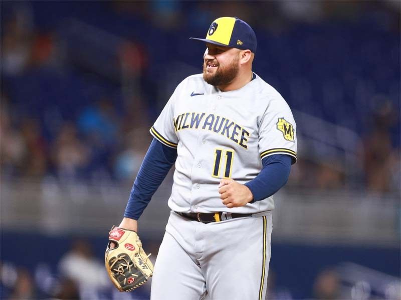 Brewers ride 12-run inning to victory, punch MLB playoff ticket