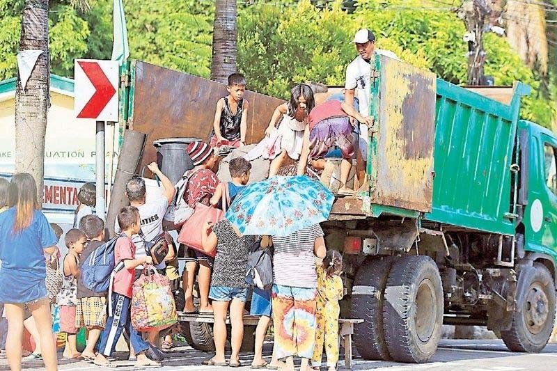 Mayon evacuees: 2,000 families return home