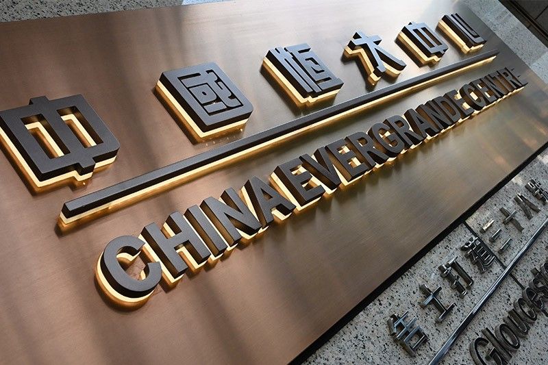 China's Evergrande resumes Hong Kong trading