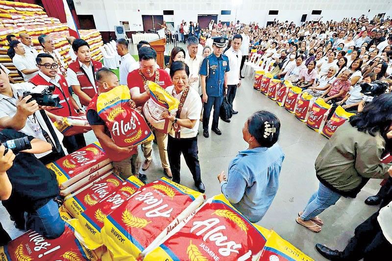 Marcos gives out seized rice to Taguig’s poor thumbnail