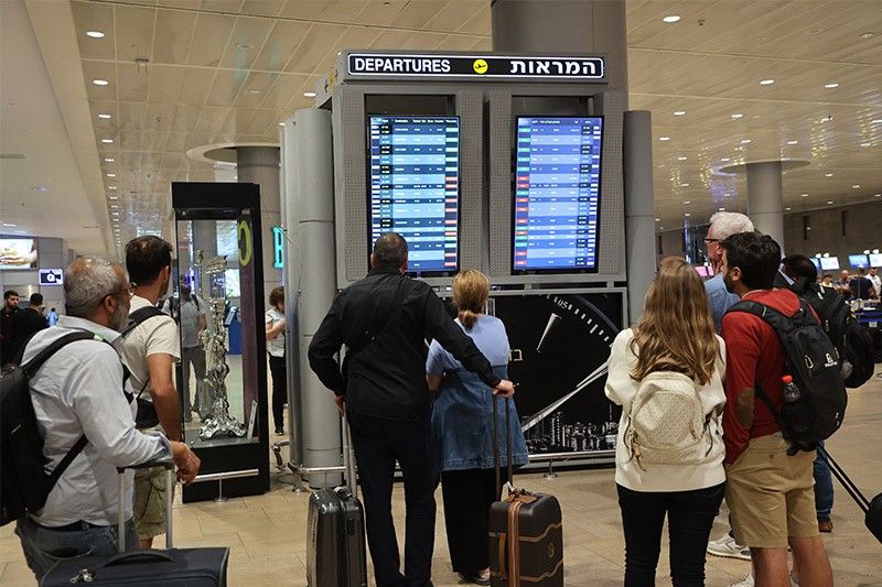 Major airlines cancel dozens of flights to Tel Aviv