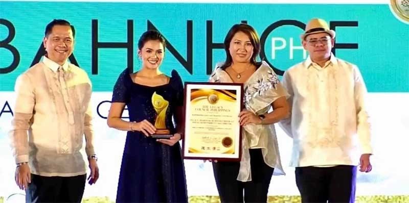 Filipino language, examination center feted with awards