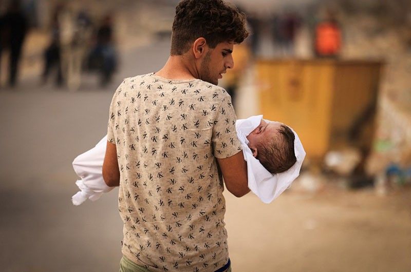 Israeli officer says he found baby beheaded in Hamas attack