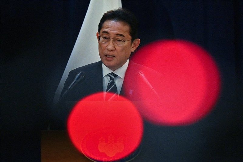 Japan PM unveils $113 billion stimulus as poll numbers slump