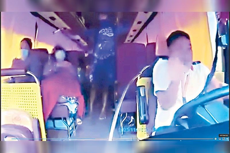 2 passengers slain while sleeping in bus