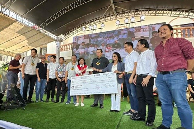 DOLE-7 turns over P30 million tupad check to capitol