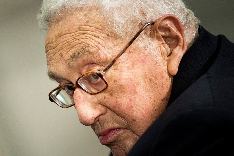 World reacts to Kissinger death