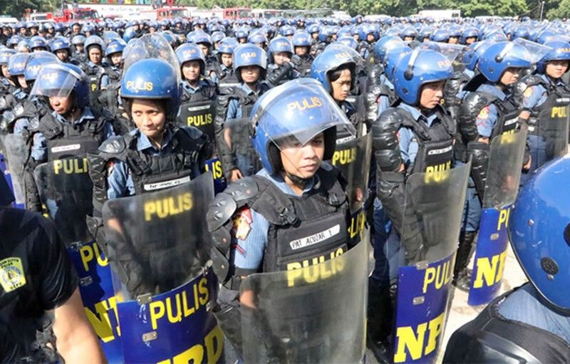 Quezon City Police District to gun-toting cop: Surrender all firearms