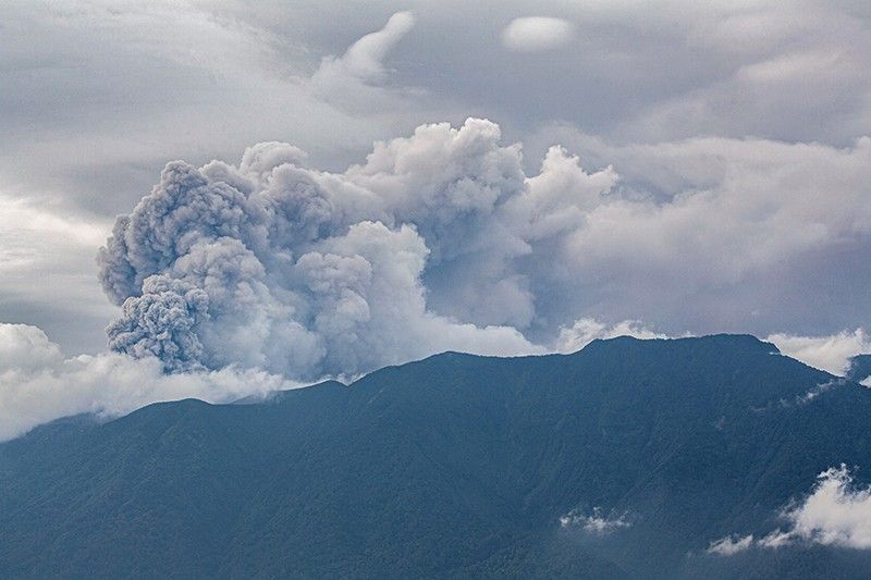 Hikers evacuated as Indonesia volcano spews ash tower