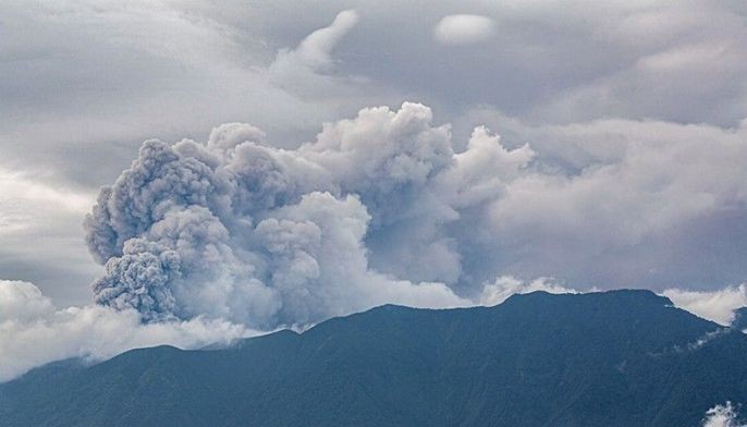 Hikers evacuated as Indonesia volcano spews ash tower