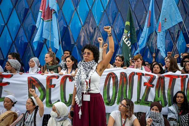 Tears and tight restrictions in Gaza protest at COP28