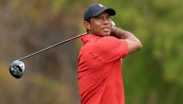 Obamas in talks to produce Tiger Woods movie