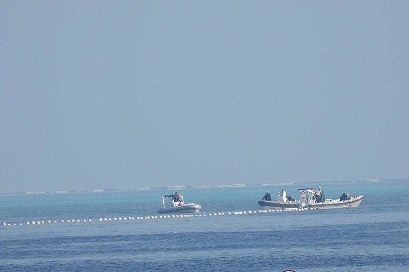 Floating barriers sa Bajo de Masinloc, tinanggal na ng Chinese Coast Guard