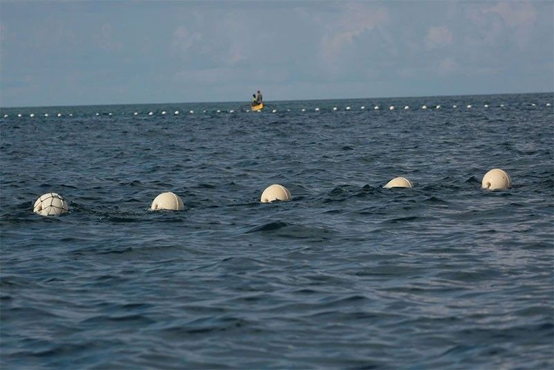 China removes its floating barriers from Panatag