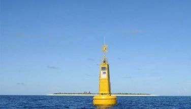 Photo shows a 30-foot navigational buoy bearing the Philippine flag and deployed by the Philippine Coast Guard at the West Philippine Sea. 