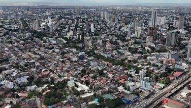 Photos show an aerial shot of Quezon City on February 10, 2024.
