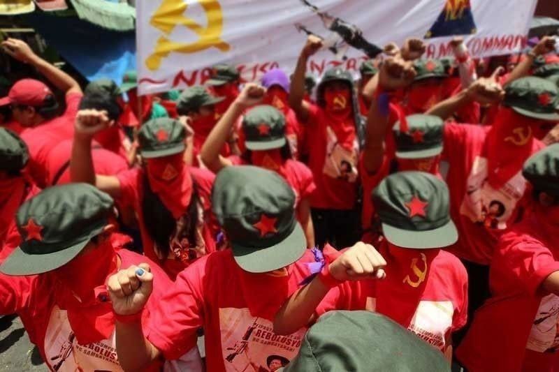 4 â��communistsâ�� surrender in Central Luzon