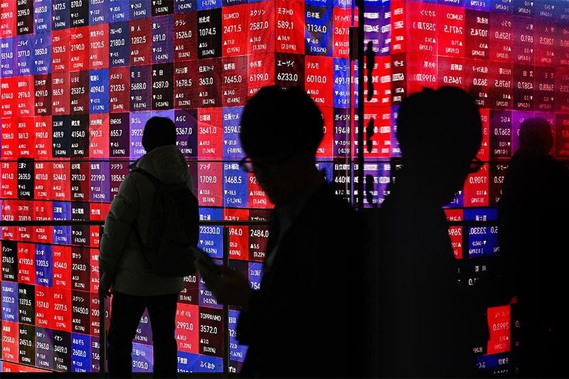 Asian markets swing ahead of key US jobs data