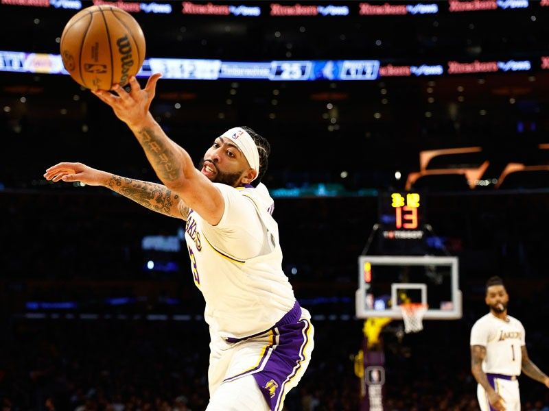 Davis makes NBA history as Lakers rout depleted Timberwolves