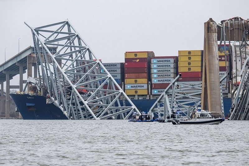 Two bodies found as Baltimore bridge collapse moves from recovery to salvage