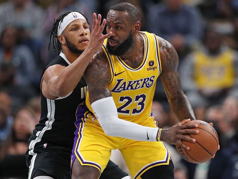 LeBron posts triple-double as Lakers repel Grizzlies