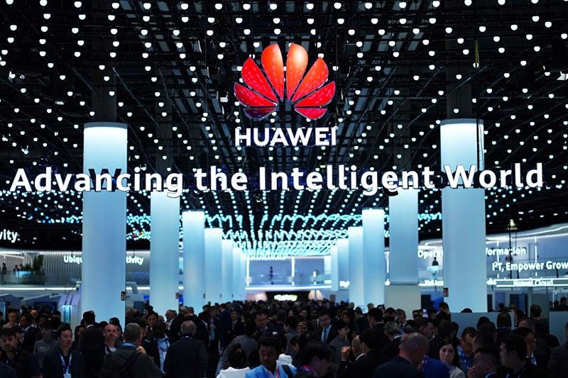 Chinese telecoms giant Huawei says profits more than doubled in 2023