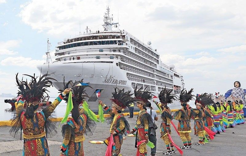 Cruise ship with European tourists docks at Subic