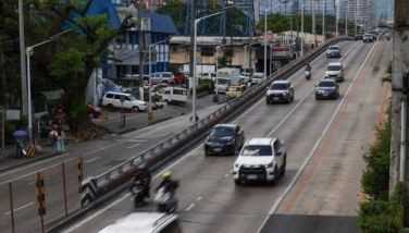 Motorists continue traversing the EDSA-Kamuning flyover in Quezon City on April 7, 2024.