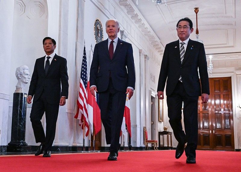 Biden vows 'ironclad' defense of Philippines, Japan as China tension mounts
