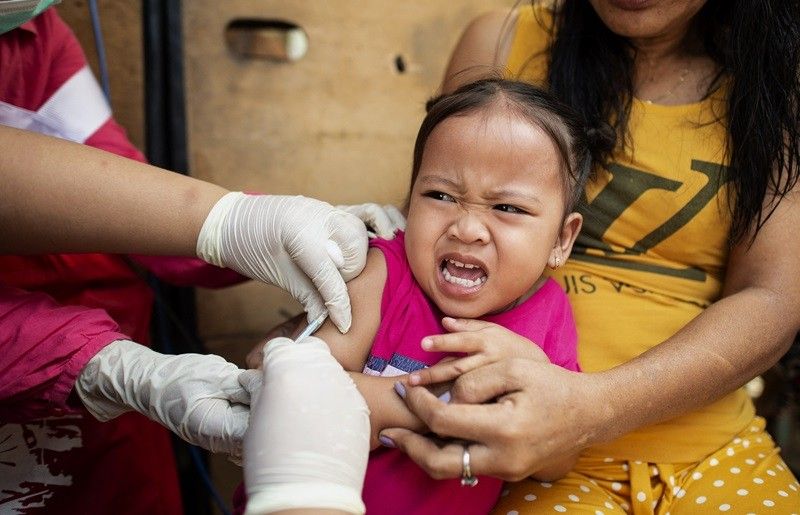 DOLE to employers: Excuse working parents during measles vaccination drive