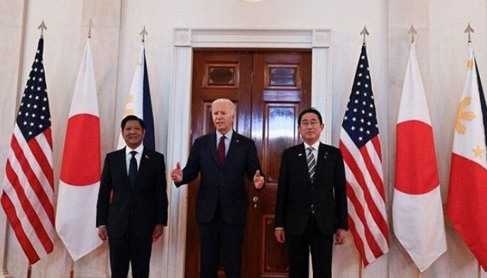 US President Joe Biden speaks to the press with Japanese Prime Minister Fumio Kishida (R) and Filipino President Ferdinand Marcos Jr. (L) at the White House in Washington, DC, April 11, 2024.