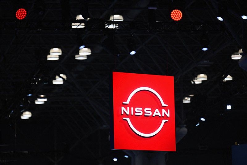 Japanese auto giant Nissan cuts sales, profit forecasts