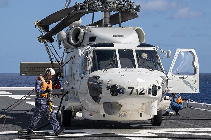 Major search operation after Japan navy choppers crash