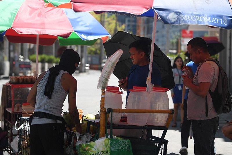 'So hot you can't breathe': Extreme heat hits the Philippines