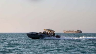 Yemeni coastguards loyal to the internationally-recognised government ride in a patrol boat in the Red Sea off the government-held town of Mokha in the western Taiz province, close to the strategic Bab al-Mandab Strait, on April 15, 2024.